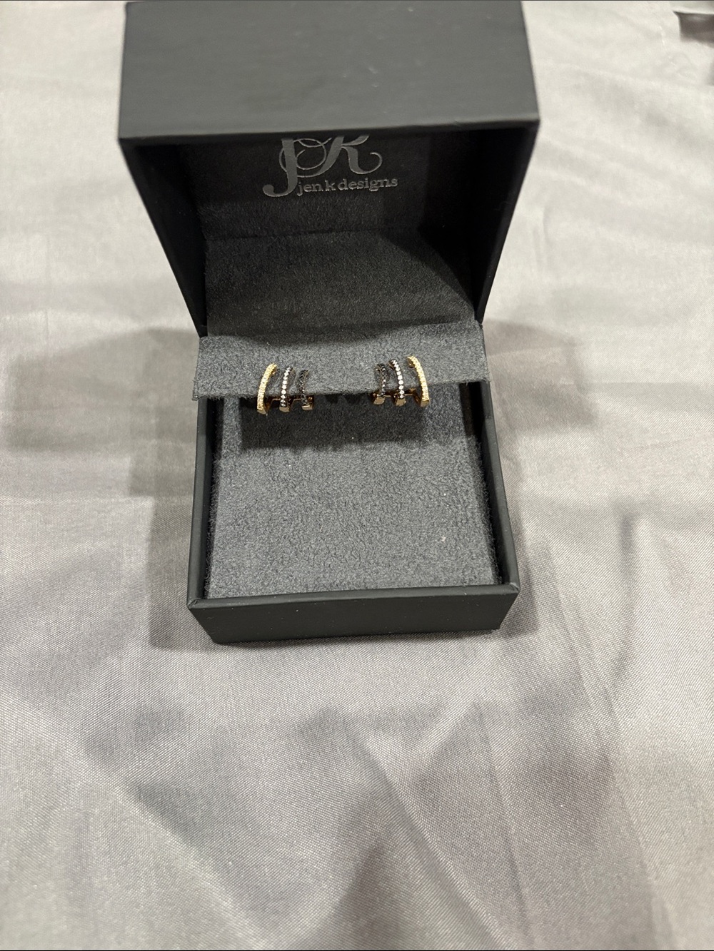 Earrings 

14K GOLD BLACK GOLD DIAMOND AND BLACK DIAMOND BRINA EARRINGS